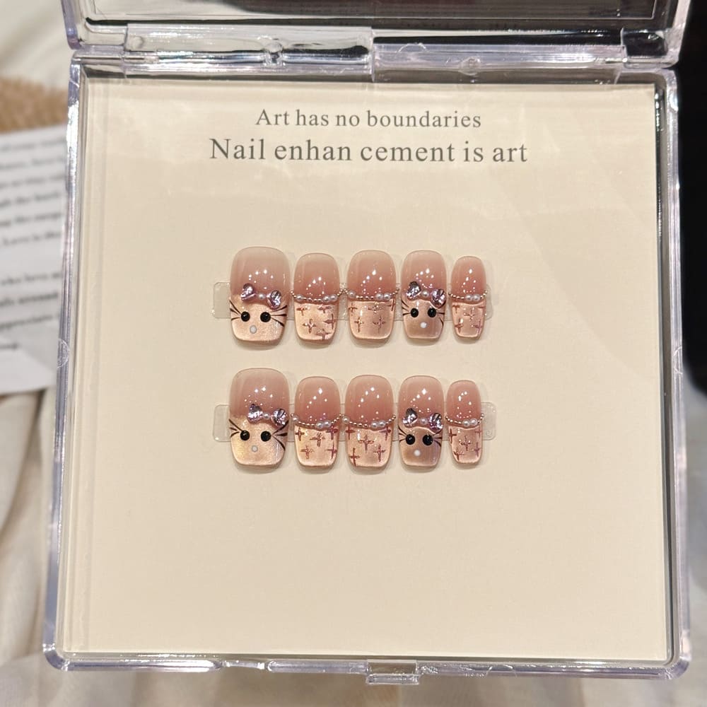 Peachy Cat‘s Eye French Tip Hand-Painted Press-On Nails